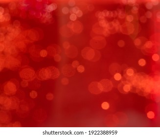 Bright red sparkly background with bokeh