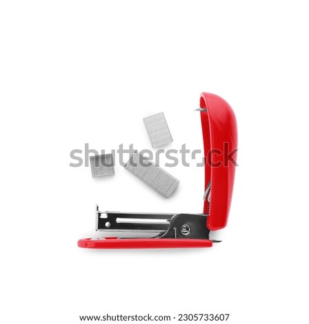 Bright red stapler with staples isolated on white, top view
