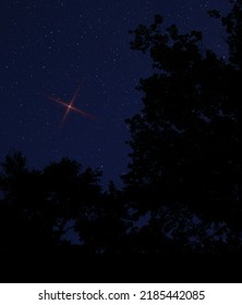 Bright Red Star Rising In The Sky In North Carolina For Christmas Eve