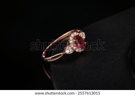 Bright ruby ??ring in a pure black background