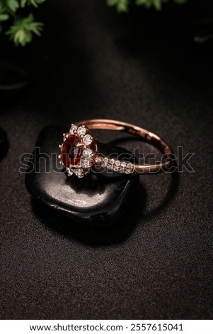 Bright ruby ??ring in a pure black background