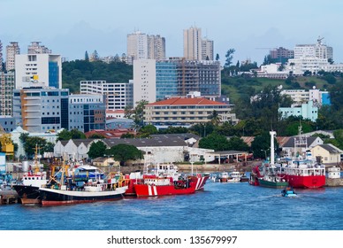 Bright scene from Maputo of ships and buildings