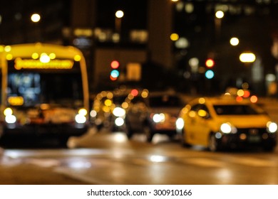 Bright Shining Blurred City, Building, Street & Taxi Lights At Night Time In The City Of Chicago, Illinois 