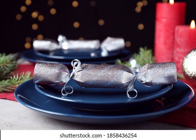 Bright Silver Christmas Cracker On Table Indoors