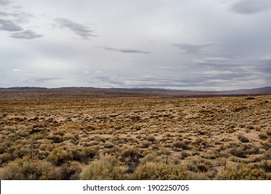 Bright Skies Over Beautiful Wide Open Desert Vista Landscape Behind Beautiful Desert Vista In Rural New Mexico