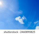 Bright sky background during the day. Blue sky and white clouds.
