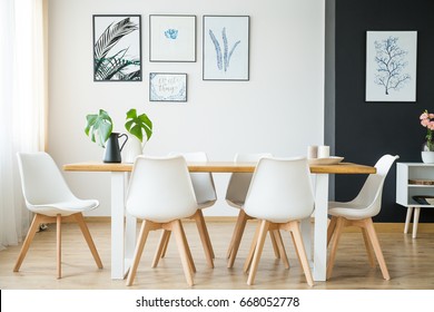 Bright Spacious Dining Room With Wooden Big Table