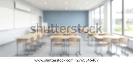 A bright and spacious modern classroom, intentionally blurred to create a sense of depth and focus on the overall environment.