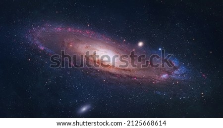 Bright spiral galaxy with stars in space. Galaxy Andromeda sci-fi high quality space wallpaper. Elements of this image furnished by NASA 
