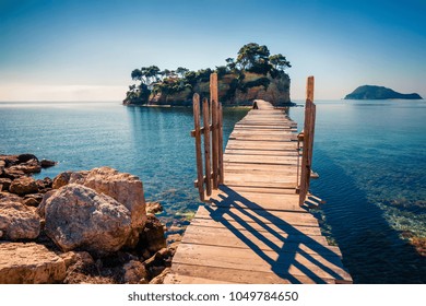 Bright spring view of the Cameo Island. Picturesque morning scene on the Port Sostis, Zakinthos island, Greece, Europe. Beauty of nature concept background. - Shutterstock ID 1049784650