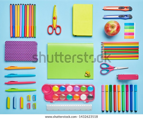 Bright\
stationery is laid out on a blue background. stationery with\
copyspace. Top view, flat lay.\
copyspace