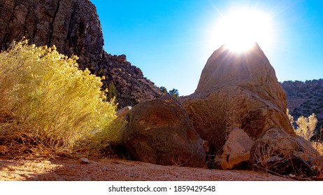 Bright Sun Cresting Over Big Rock In Diablo Canyon New Mexico