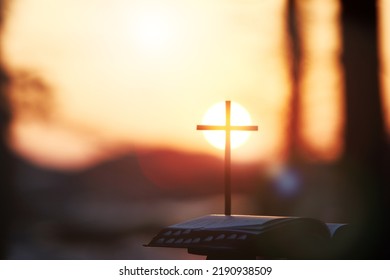 Bright Sunlight, Bible And Holy Jesus Christ Cross Silhouette
