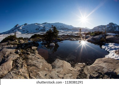 Bright Sunlight Falls On High Mountain Scenery In California's Desolation Wilderness, Not Far From Lake Tahoe. This Beautiful Part Of The Sierra Nevada Mountains Is Popular For Camping And Hiking.