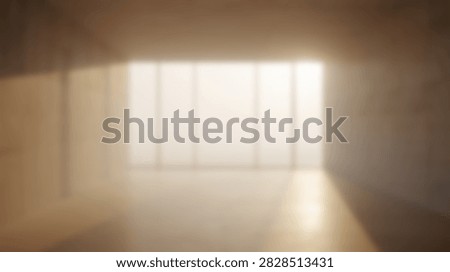 Bright sunlight illuminates a modern empty room with large windows, creating a peaceful and serene atmosphere.