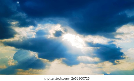 Bright sunlight pierces through dramatic dark blue and white clouds, creating striking light rays.