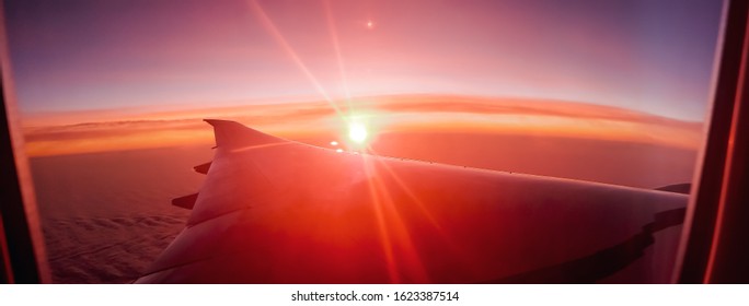 Bright Sunrise From Airplane Window