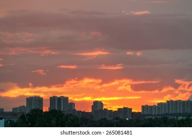 Bright sunset with dramatic cloudscape over skyline
