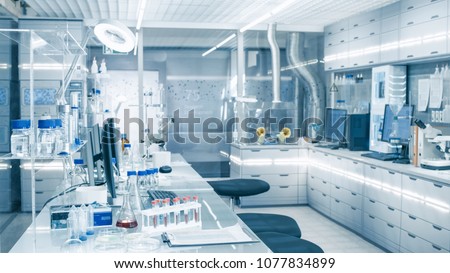 Bright and Ultra Modern High Tech Laboratory Full of Advanced Technological Wonders, Computers, Analyzing Machines, Test Tubes and Beakers.