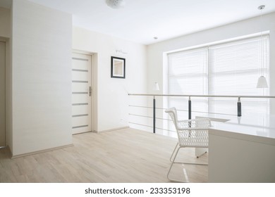 Bright, White Corridor On Mezzanine Floor