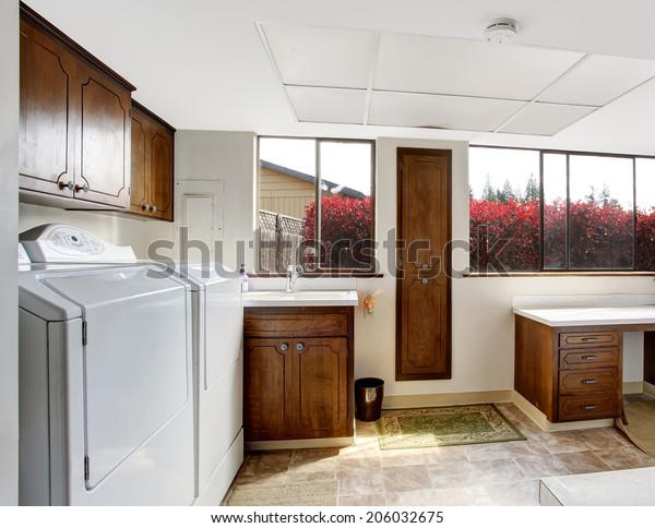 Bright White Laundry Room Dark Brown Royalty Free Stock Image