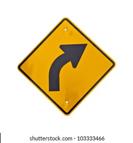 A bright yellow hazard sign of road curved ahead on a white background.