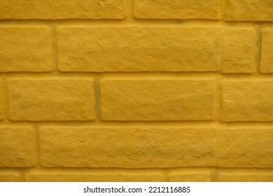 Bright Yellow Painted Brick Veneer Wall Texture