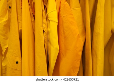 Bright Yellow Rain Jackets Background Coat