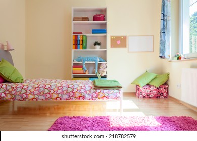 Bright Yellow Room With Pink Decorations For Girl