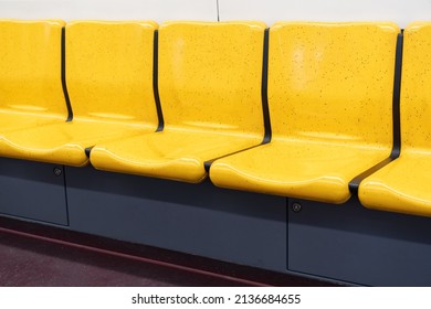 Bright yellow seats on the train