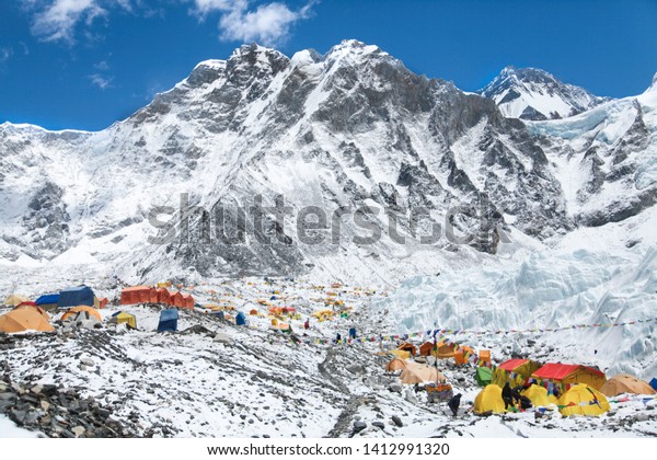 Bright yellow tents in Mount Everest base\
camp, Khumbu glacier and mountains, sagarmatha national park, trek\
to Everest base camp - Nepal\
Himalayas
