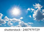 brightening the puffy clouds with the sun. sky perspective. gorgeous sky filled with sunlight. Clouds against a blue sky background. clouds against a clear sky.