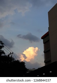 The brightest cloud among clouds faces bravely with the light from the sunset at the end of the day.