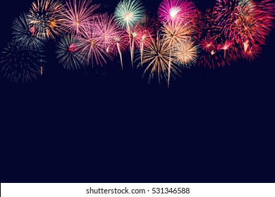 Brightly Colorful Fireworks on twilight background