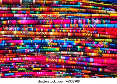 Brightly Coloured Textiles In Craft Market, Ecuador