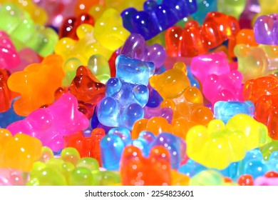 Brightly lit gummy bear sweets. Shallow depth of field, central focus. - Shutterstock ID 2254823601