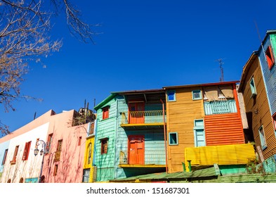 Brightly Painted Buildings In La Boca Neighborhood Of Buenos Aires, The Birthplace Of Tango