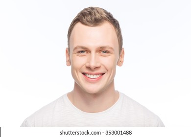 Brightly Smile. Young Handsome Smiling Man Is Posing On The Camera. 