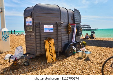                         Brighton beach, Brighton and Hove, East Sussex, England, June 15th 2018 a pop up sauna on the beach made from a horse box, wood fired and very popular