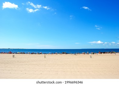 Brighton Beach in the summer with blue sky and blue ocean on a summer day. Brooklyn, New York. July 4, 2009.