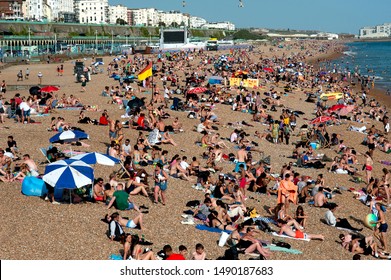 Brighton Beach, Sussex, England, August 2019. People Flock To The Beach In Brighton To Sunbathe And Swim In The Record Breaking Hot Temperatures Of 2019.