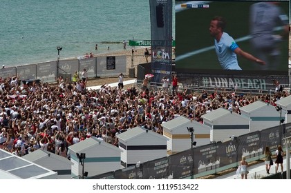 Brighton Beach UK 22nd June 2018 . World Cup Football Fans celebrate at Brighton beach big screen watching England v Panama During Harry Kane's 22nd minute Penalty Goal.