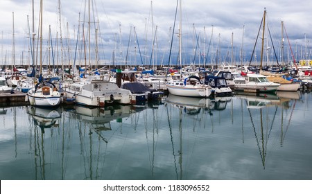 BRIGHTON, ENGLAND - SEPTEMBER 08 2018: Yachts and boats in Brighton Marina, East Sussex, UK, residential and leisure complex on September 08, 2018 - Shutterstock ID 1183096552