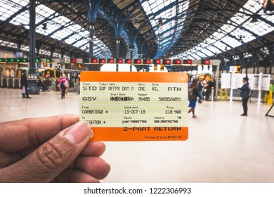 Brighton, England-18 October,2018: Hand Holding A UK Train Ticket At Brighton & Hove Train Station For Background In Brighton, England.