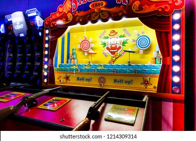 Brighton, England-2 October,2018: Classic Vintage Sideshow Shooting Gallery Theme Park Arcade Game Carnival In Casino Game At The Hollywood Bowl Brighton Marina The Place For Entertainment And Fun.
