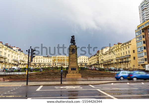 Brighton and Hove, East Sussex, UK - November 4,\
2019: The statue of South African War Memorial for fallen men of\
Royal Sussex Regiment at Regency Square in Brighton, East Sussex,\
England, UK.