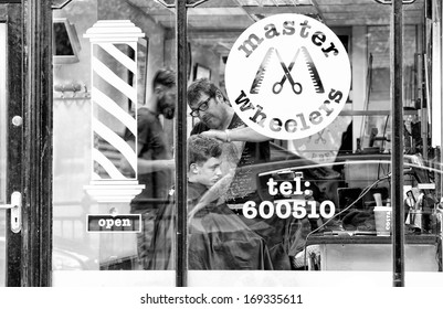 BRIGHTON, OCTOBER 14, 2013: Master Wheelers is a famous old style barber shop in North Laine, Brighton, United Kingdom.