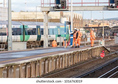 Brighton Station, Sussex, UK; 4th February 2018; Group Of Rail Workers In High Viz Clothing