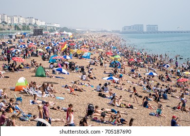 Brighton, UK - August 28, 2017: Brighton Beach Packed With People Enjoying The Sun And Bathing During A Late Summer Heatwave