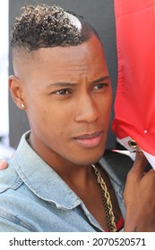 Brighton, UK Circa 2010 Close Up Portrait Of A Handsome Young Black Man In The Procession At Pride Brighton.